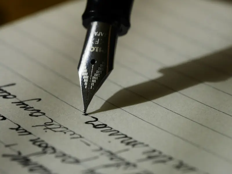 Open notebook with pen for writing ideas
